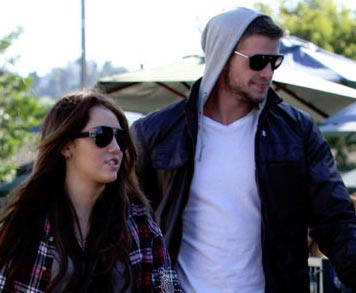 Photo of Miley Cyrus with Liam Hemsworth