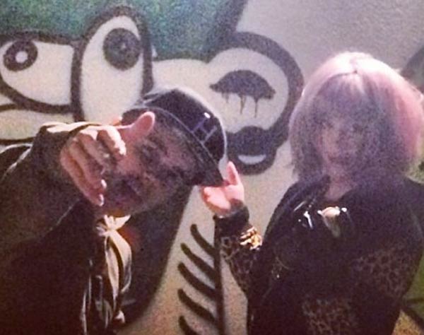 Kelly Osbourne and Justin Bieber hanging out doing art