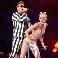 Miley Cyrus twerkin on singer Robin Thicke at MTV VMA Awards