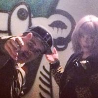 Kelly Osbourne and Justin Bieber hanging out doing art