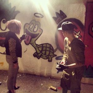 Kelly Osbourne and Justin Bieber graffiti art together